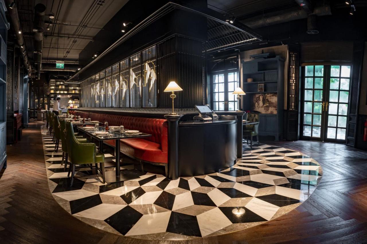 Готель W Маскат Екстер'єр фото Interior of the restaurant